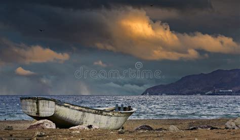 Old fishing boat at sunset stock photo. Image of travel - 36029880