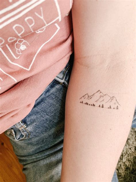 mountain tattoo | Small wrist tattoos, Mountain tattoo, Line tattoos