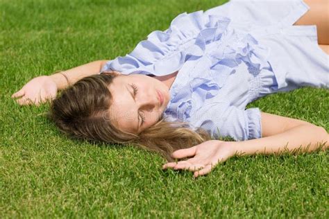 Beautiful Girl Lying Down of Grass Stock Photo - Image of happiness ...