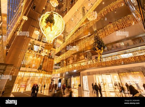 Hudson Yards Shopping Mall with illuminated Christmas decorations in evening. Midtown Manhattan ...