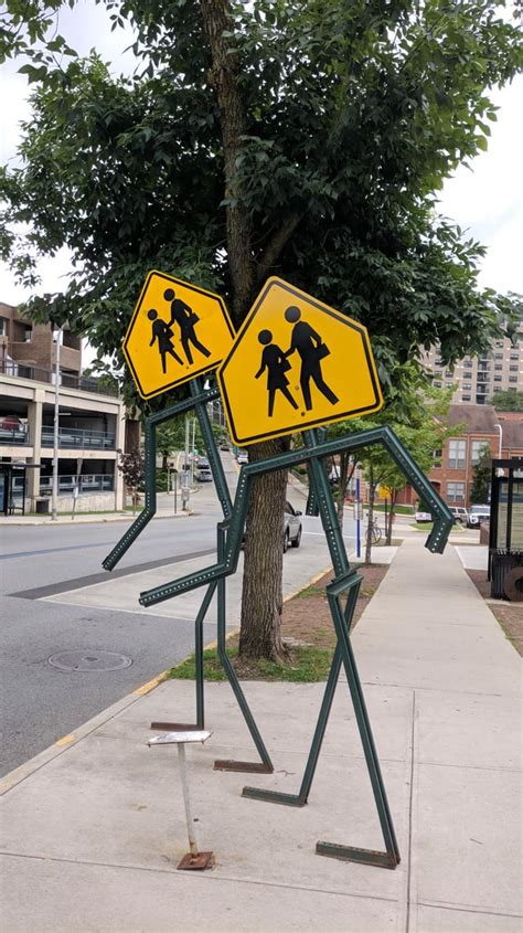 these school crosswalk signs are shaped like stick figures : r/mildlyinteresting