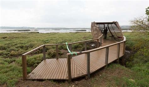 Corroios marshland birds observatory - Bird blind | Bird watching tower, Earthship, Signage design