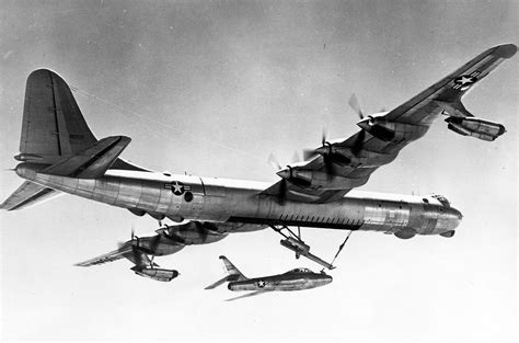 B-36 Bomber releasing a FICON F-84 Thunderjet. The fighter could be ...