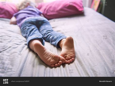 Close up of the feet of a sleeping girl stock photo - OFFSET - DaftSex HD