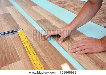 Contractor Laying Image & Photo (Free Trial) | Bigstock