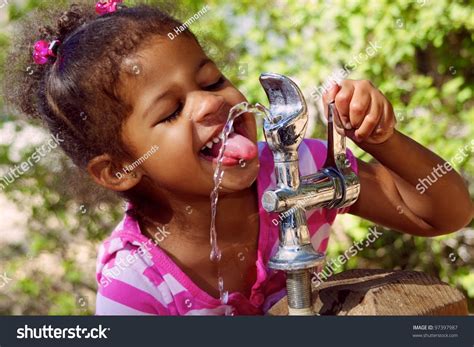 Adorable Child Drinking From Outdoor Water Fountain Stock Photo 97397987 : Shutterstock