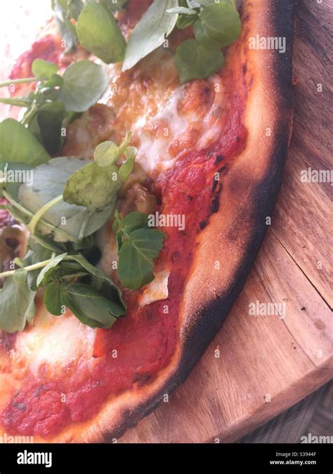 Home made pizza on the pizza oven Stock Photo - Alamy