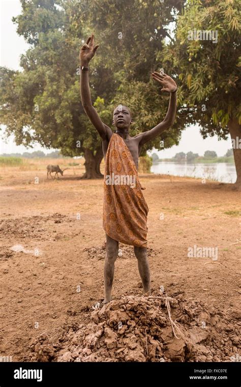 South Sudan. 21st Feb, 2016. A young Mundari boy makes the hand signal of the tribe. It ...