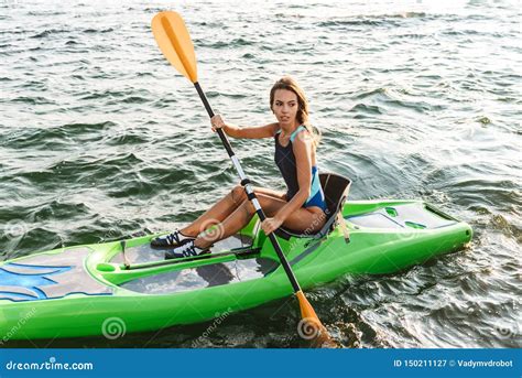 Healthy Fit Girl on a Kayak in the Ocean Stock Image - Image of rowing, ocean: 150211127