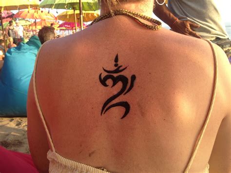 Bali good luck symbol tattoo | Tattoos, Symbolic tattoos, Balinese tattoo