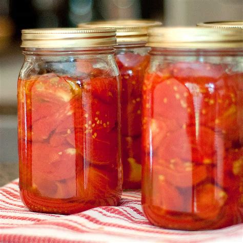 Canning Tomatoes! From cutting them to putting them in the pot to cook to canned in jars. Bushel ...