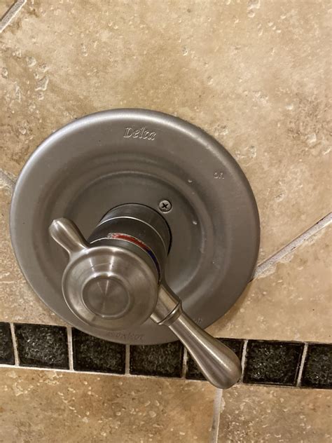 Help removing the cover of a shower knob? Can’t find set screw! | DIY ...