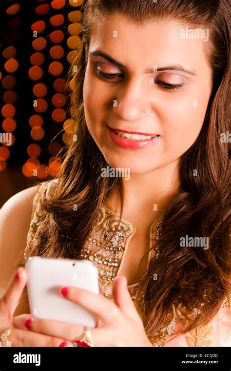 1 indian Lady diwali Festival Chatting phone Stock Photo - Alamy