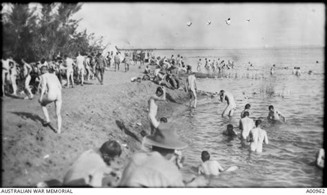 Australian soldiers bathing naked in the lake. | Australian War Memorial