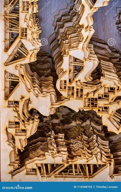 Plywood cut by the laser stock image. Image of action - 116948703