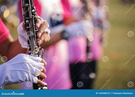 Hands of Man Playing the Clarinet in the Marching Band Stock Photo ...