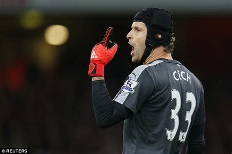 Arsenal keeper Petr Cech wants to play without a helmet... but doctors ...