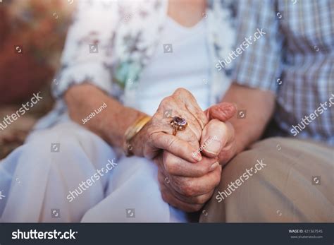 28,935 Old Couple Holding Hands Images, Stock Photos & Vectors ...