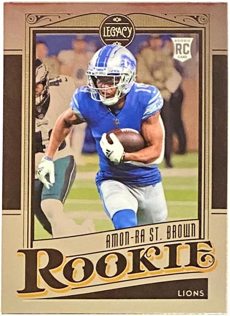 Amon-Ra St. Brown 2021 Panini Chronicles Football Legacy Rookie Card ...