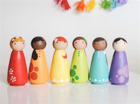 Pin by Lenkaland on ModernTOTshoppe | Peg dolls, Wood peg dolls, Doll sets