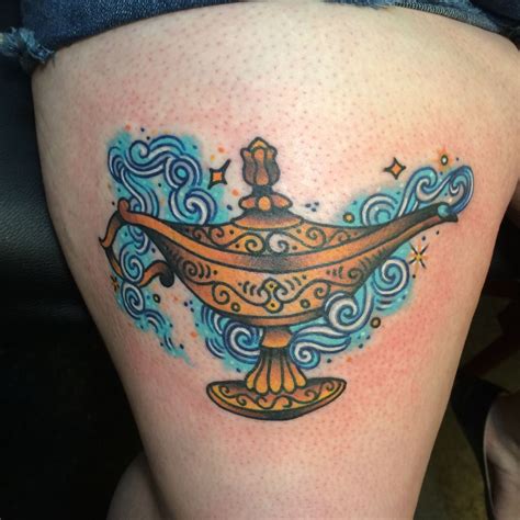 aladdin magic lamp tattoo | Tatuagem aladdin, Tatuagens, Tatuagem