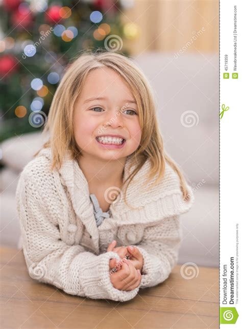 Festive Little Girl Smiling at Coffee Table Stock Image - Image of cardigan, childhood: 45719359