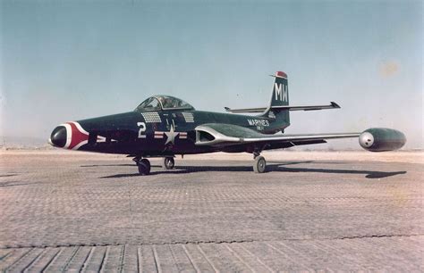 McDonnell Douglas F2H-2P Banshee from VMJ-1 parked on a runway at an ...