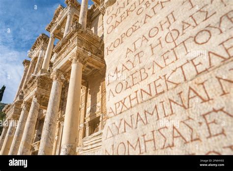 Ancient greek inscriptions on the wall of Celsus Library in the Ephesus ancient city, Turkey ...