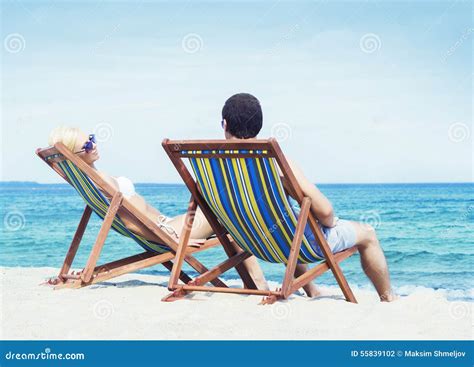 Man and Woman Chilling on a Summer Beach Stock Photo - Image of female ...