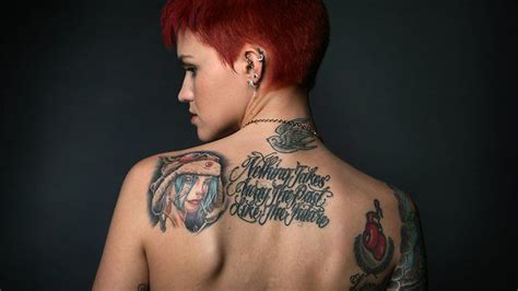 Her tattoos are Uh-Mazingg ! | Rose neck tattoo, Ruby rose tattoo, Ruby ...