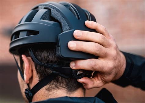 The FEND One bicycle helmet folds inwards to make it more portable ...