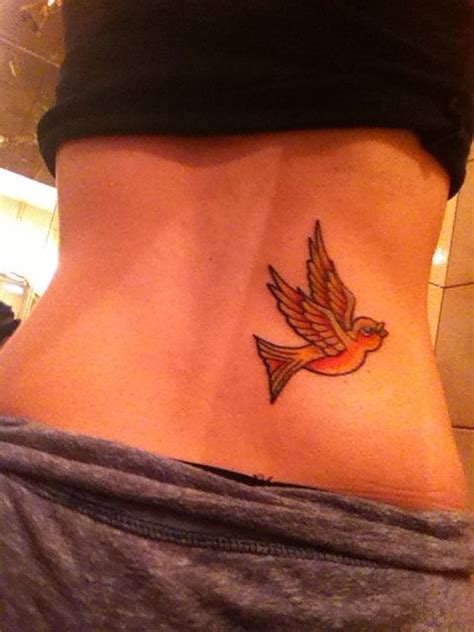 yellow bird tattoo | Yellow bird tattoo, Tattoos, Leaf tattoos