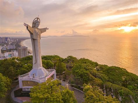 Premium Photo | Top view of vung tau with statue of jesus christ on mountain the most popular ...