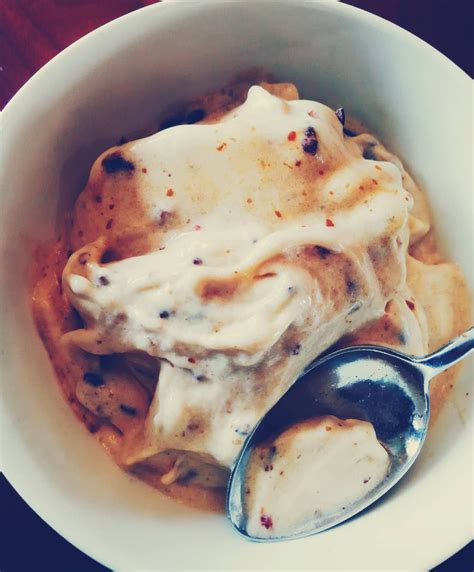 Banana nice cream (frozen banana) with caramel sauce (medjool dates + water) and chocolate chips ...