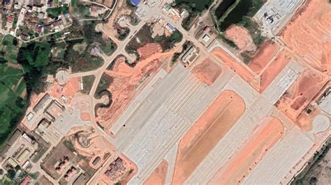 Satellite photos reveal extent of China’s military airfield expansion