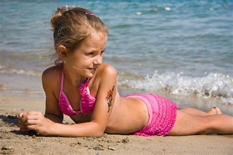 Young girl at the beach stock photo. Image of sand, summer - 10798290