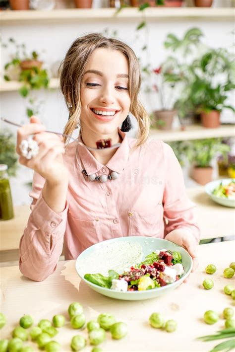 Woman eating healthy food stock photo. Image of happy - 110356170