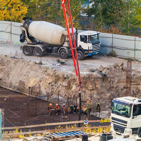 Construction of the building. Pouring the concrete foundation slab ...