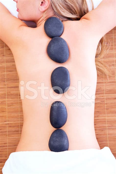 Volcanic Stone Massage Stock Photo | Royalty-Free | FreeImages