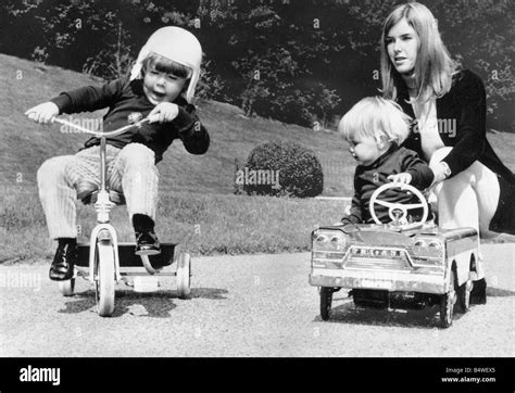 Helen Stewart wife of racing driver Jackie Stewart with sons Paul Stewart L and Mark Stewart ...