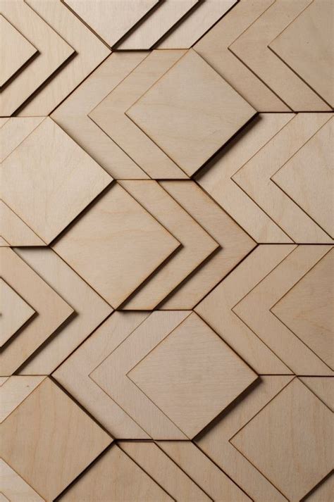 Overlapping CNC'ed wood panels create a beautiful geometric design. | Wall patterns, Wood ...