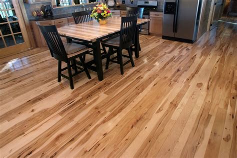 3" & 4" wide character grade hickory hardwood floor with a clear semi ...