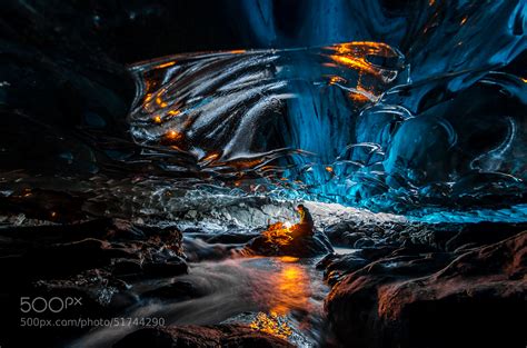 Interesting Photo of the Day: Playing with Fire in Ice Caves