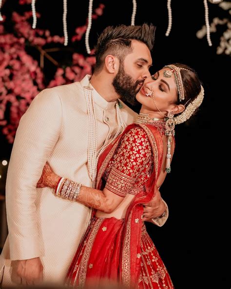 Mouni Roy wore a red Sabyasachi lehenga for her wedding | VOGUE India