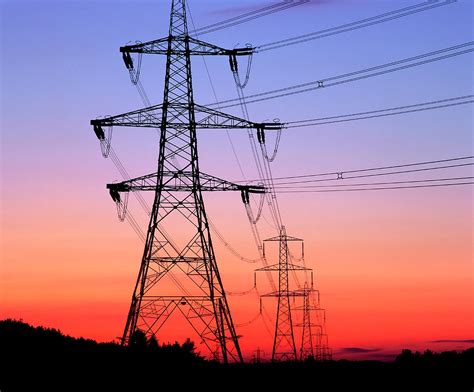 Electricity Pylons & Transmission Lines At Sunset Photograph by Martin Bond/science Photo ...