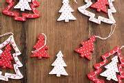 Photo of Stylish wooden tree shaped Christmas ornaments | Free ...
