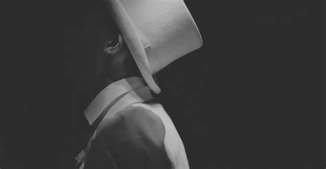 Man Wearing White Hat Greyscale Photography · Free Stock Photo