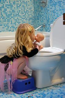 while potty training her baby doll dahlia senses she is ge… | Flickr