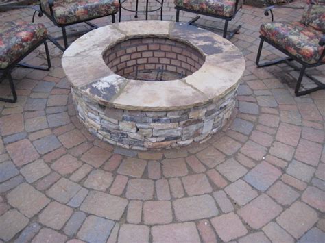 Stacked Stone Firepit with Flagstone Cap. - like the brick work! designed by Boyce Design ...