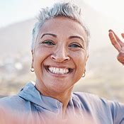 Elderly woman runner, exercise selfie and smile in nature for fitness, wellness or self care ...